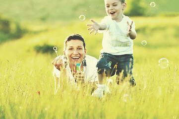 Image showing woman child bubble