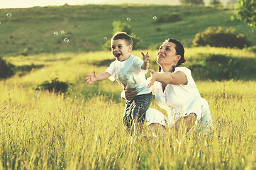 Image showing woman child bubble