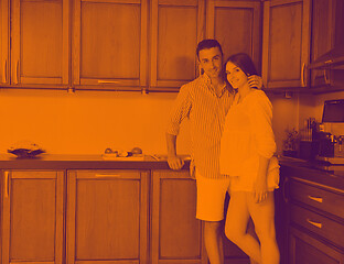 Image showing happy young couple have fun in modern kitchen