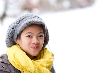 Image showing Girl playing in the snow in winter in denmark