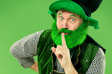 Image showing A man in a leprechaun hat at studio. He celebrates St. Patrick\'s Day.