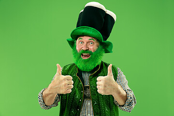 Image showing A man in a leprechaun hat at studio. He celebrates St. Patrick\'s Day.