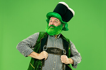 Image showing A man in a leprechaun hat at studio. He celebrates St. Patrick\'s Day.