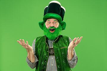 Image showing A man in a leprechaun hat at studio. He celebrates St. Patrick\'s Day.