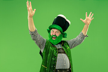 Image showing A man in a leprechaun hat at studio. He celebrates St. Patrick\'s Day.