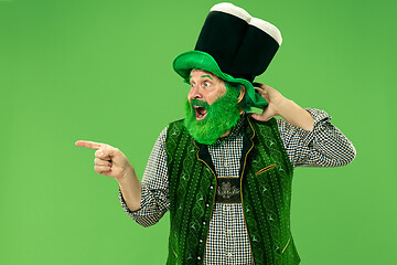 Image showing A man in a leprechaun hat at studio. He celebrates St. Patrick\'s Day.