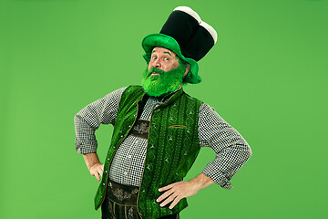 Image showing A man in a leprechaun hat at studio. He celebrates St. Patrick\'s Day.