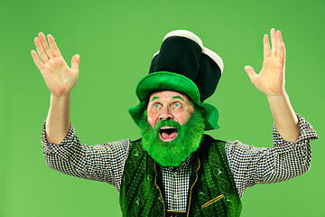 Image showing A man in a leprechaun hat at studio. He celebrates St. Patrick\'s Day.