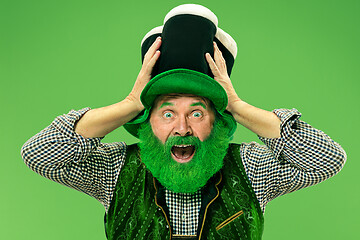 Image showing A man in a leprechaun hat at studio. He celebrates St. Patrick\'s Day.