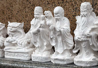 Image showing SAIGON, VIETNAM - JANUARY 04, 2015 - Statuettes representing Buddhist deities