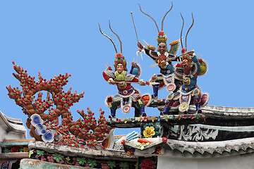 Image showing Warriors on a temple roof