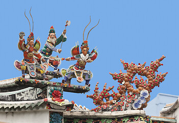 Image showing Warriors on a temple roof