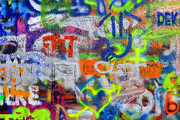 Image showing Detail of bright colorful John Lennon's wall with graffiti in Pr