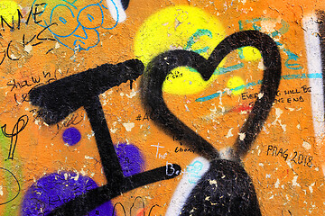 Image showing Detail of bright colorful John Lennon's wall with graffiti in Pr