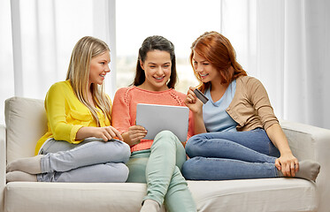 Image showing teenage girls with tablet pc and credit card