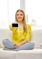 Image showing young woman or teen girl with smartphone at home