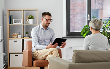 Image showing psychologist with tablet pc and senior patient