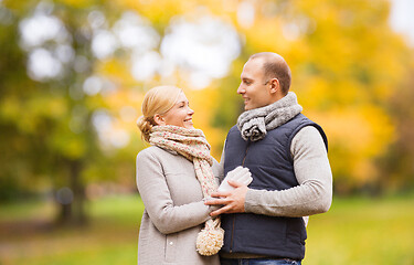 Image showing smiling couple in autumn park