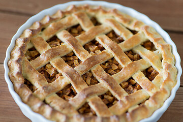 Image showing close up of apple pie on wooden table