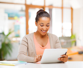 Image showing african american woman with tablet computer