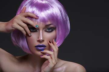 Image showing Beautiful girl in purple wig