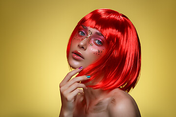 Image showing Beautiful girl in red wig