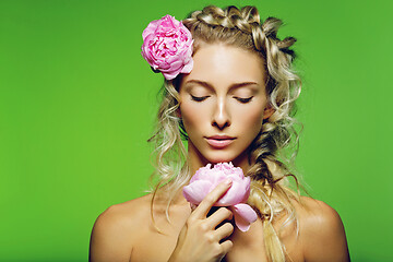 Image showing Beautiful girl with peony flower