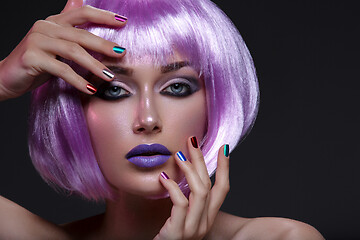 Image showing Beautiful girl in purple wig