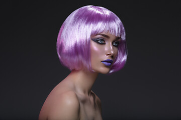 Image showing Beautiful girl in purple wig