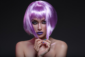 Image showing Beautiful girl in purple wig