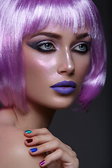 Image showing Beautiful girl in purple wig