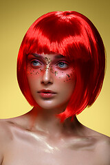 Image showing Beautiful girl in red wig