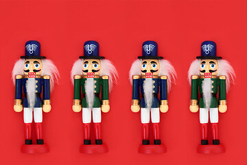 Image showing Christmas Nutcracker Toy Soldiers on Red Background 