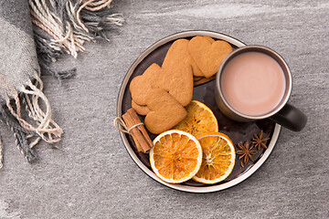 Image showing hot chocolate with dried orange, cookies and anise