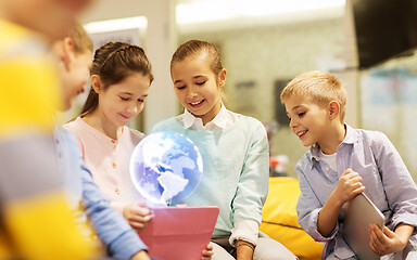 Image showing children with tablet pc and earth planet hologram