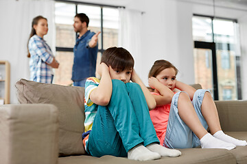 Image showing sad children and parents quarreling at home