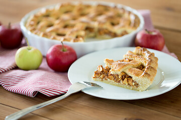 Image showing close up of apple pie and fork on plate