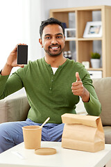 Image showing indian man using smartphone for food delivery