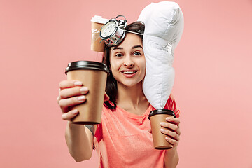 Image showing Tired woman at home having too much work. Bored businesslady with pillow and coffee