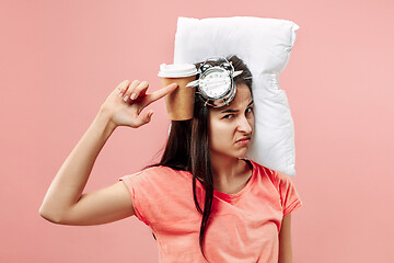 Image showing Tired woman at home having too much work. Bored businesslady with pillow and coffee