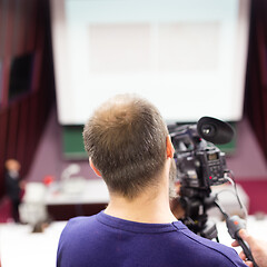 Image showing Television broadcasted press conference.