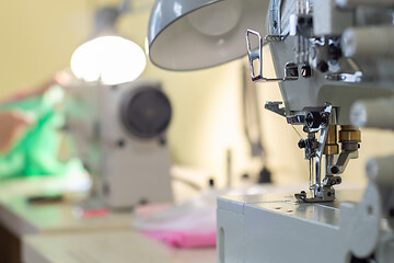 Image showing close-up of the needle sewing machine in the workshop atelier