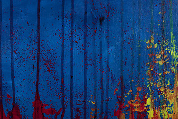 Image showing Blue, red and yellow colored wall texture background. 