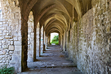 Image showing Ancient alley with brick archts in old town.