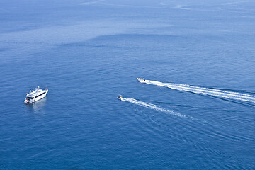 Image showing View of boats sailing across the blue clear waters of Adriatic S