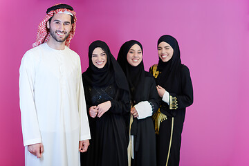 Image showing portrait of young muslim people isolated on pink