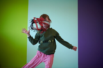 Image showing girl having fun and dancing wearing mothers jewelry