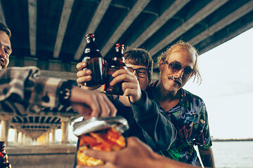 Image showing Group of friends celebrating, resting, having fun and party in summer day