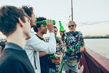 Image showing Group of friends celebrating, resting, having fun and party in summer day