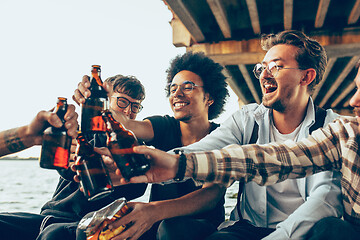 Image showing Group of friends celebrating, resting, having fun and party in summer day